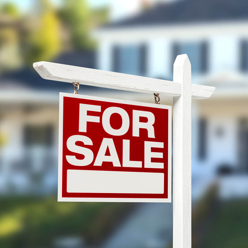 A home for sale sign.