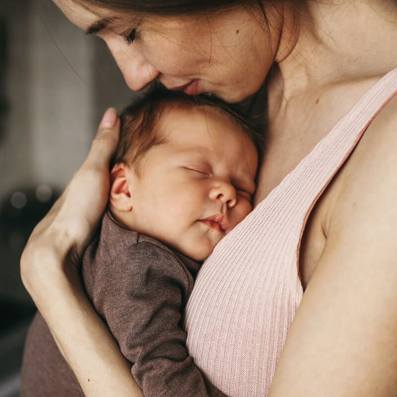 A mother and her young baby.