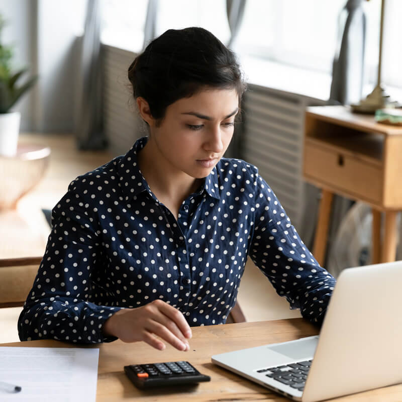 A young woman manages her money.
