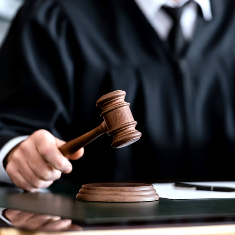 A judge with his gavel.