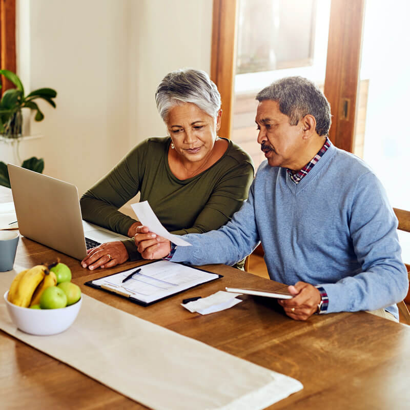 An older couple reviews bills