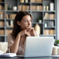 A thoughtful woman considering her options.