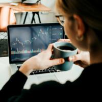 A woman reviews her investments.