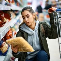 A woman shopping at the supermarket.