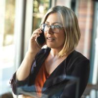 A woman receiving a phone call