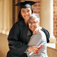 A new college graduate with her mother.